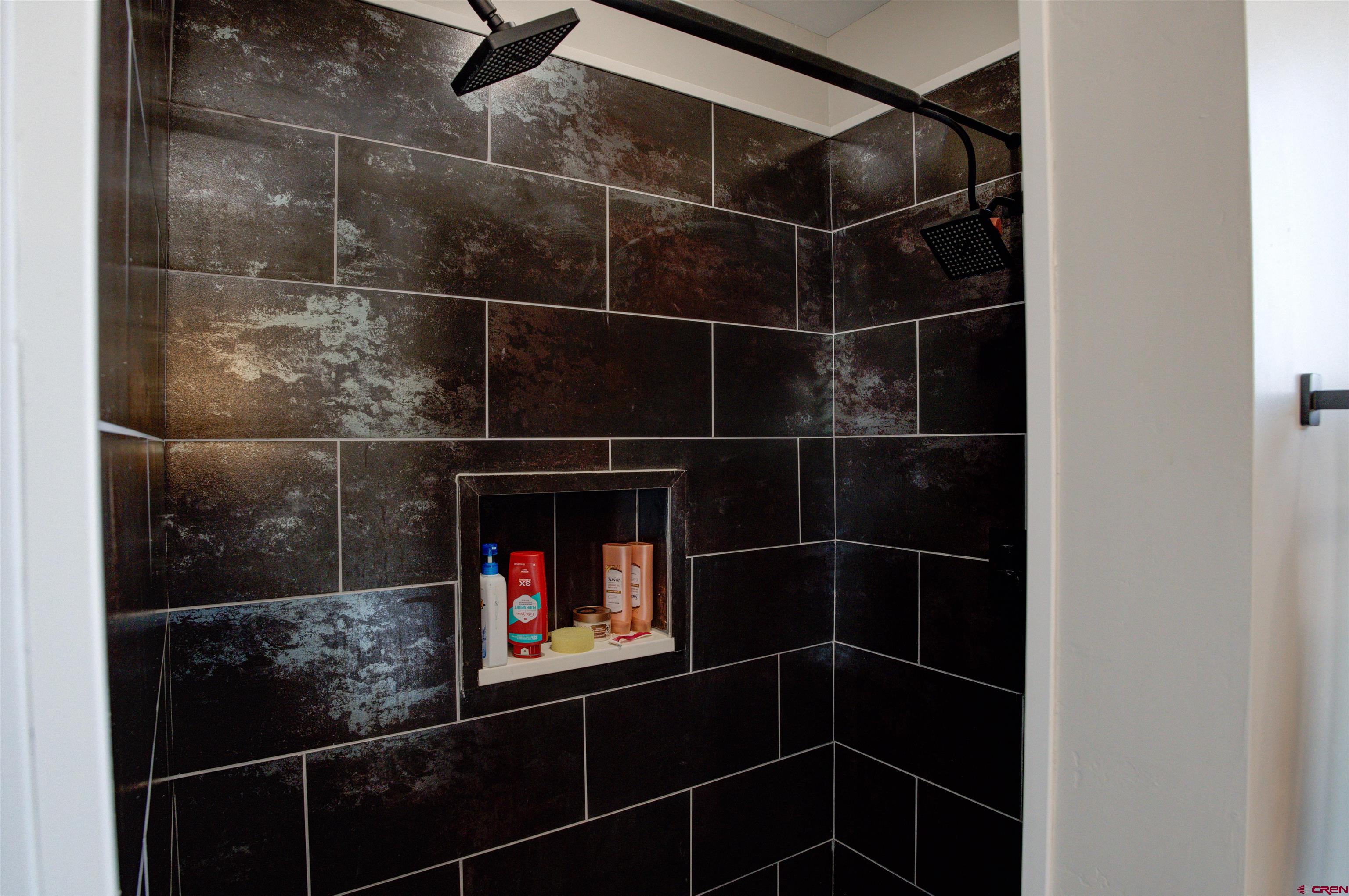 13205 Road 17.9 Loop Cortez, CO 81321 - Photo 22 of 35 a bathroom with a glass shower