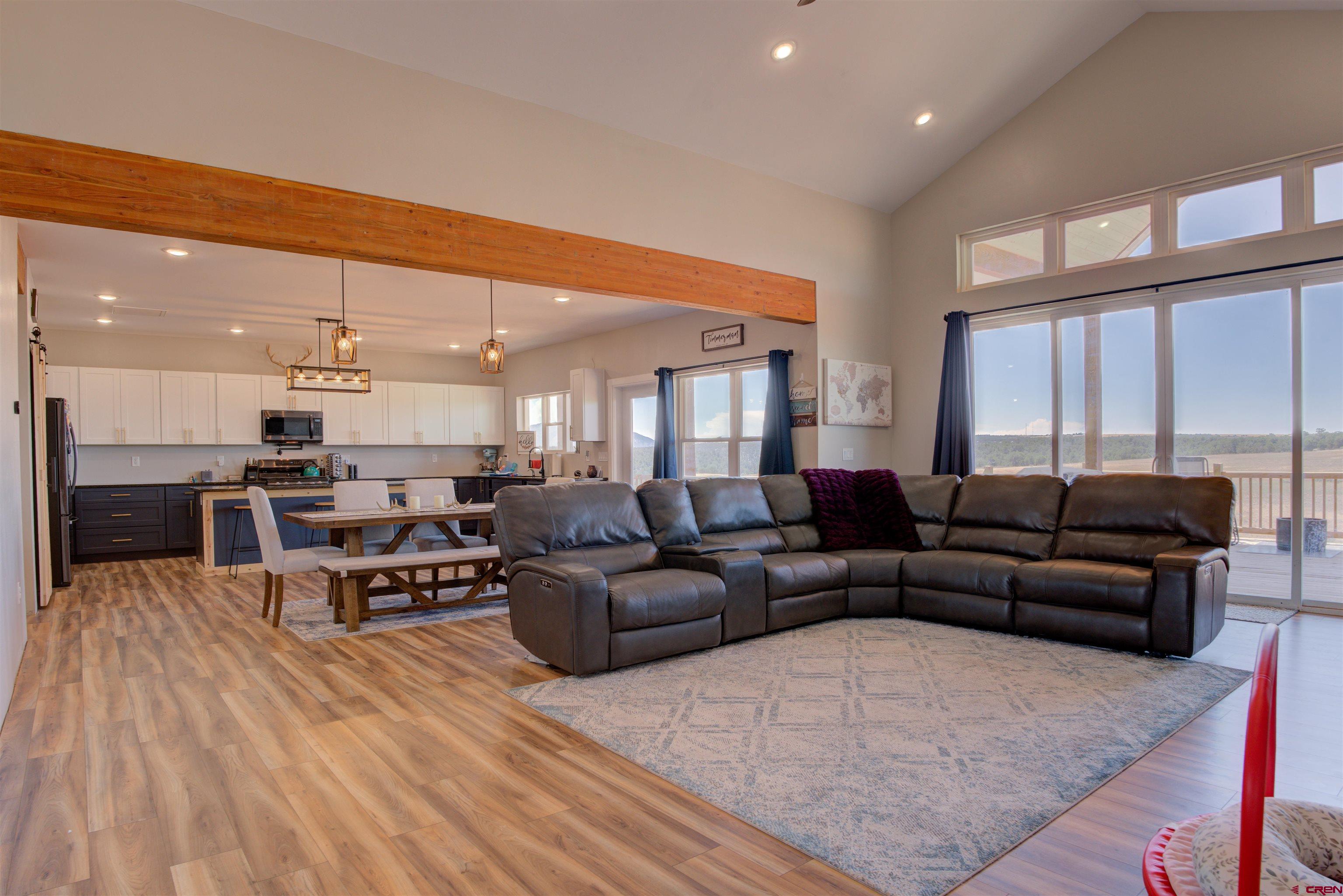 13205 Road 17.9 Loop Cortez, CO 81321 - Photo 8 of 35 a living room with furniture and a large window
