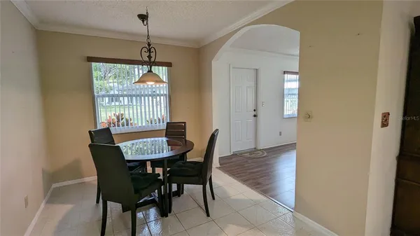 a kitchen with a sink appliances and cabinets