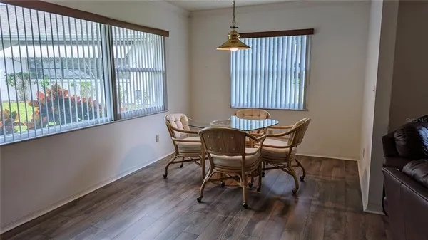 a view of furniture and wooden floor