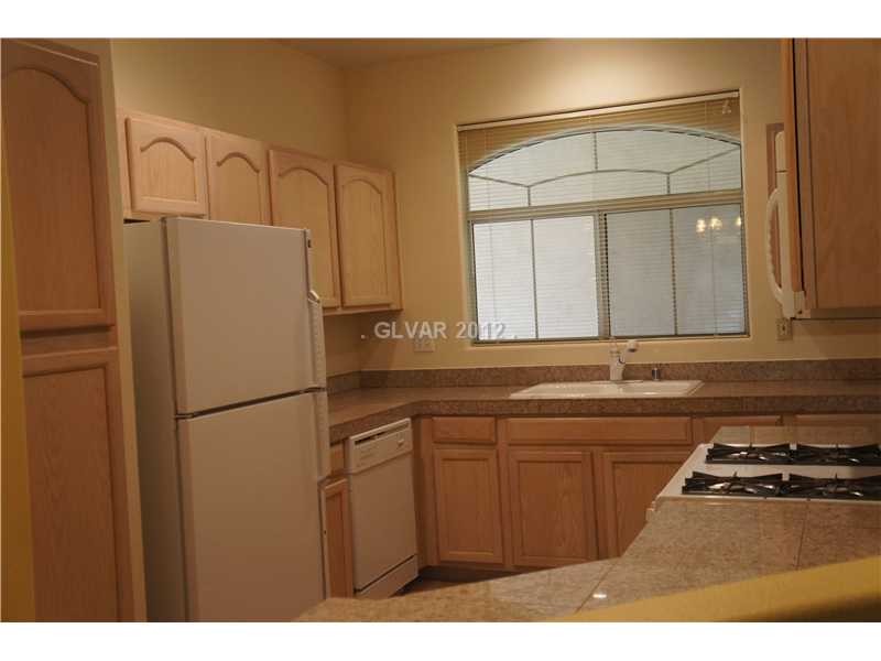 2050 West Warm Springs Road, Unit 3921 Henderson, NV 89014 - Photo 3 of 12 Kitchen. Kitchen features all appliances and granite tile counters!