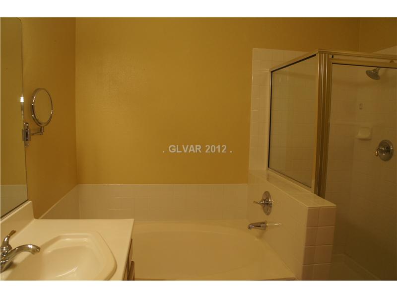2050 West Warm Springs Road, Unit 3921 Henderson, NV 89014 - Photo 6 of 12 Master Bath/Spa. Master bath features large soaking tub and seperate shower.