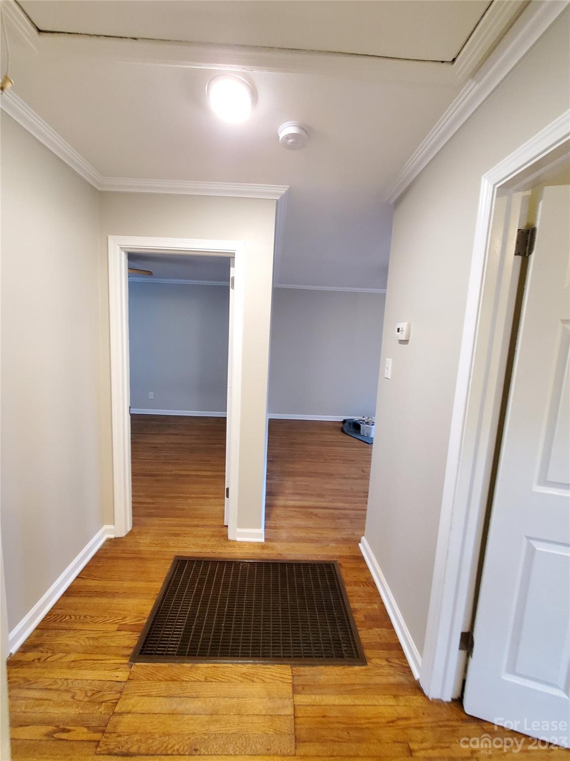 1545 Walton Road, Unit 1547 Charlotte, NC 28208 - Photo 13 of 25 a view of a hardwood & door