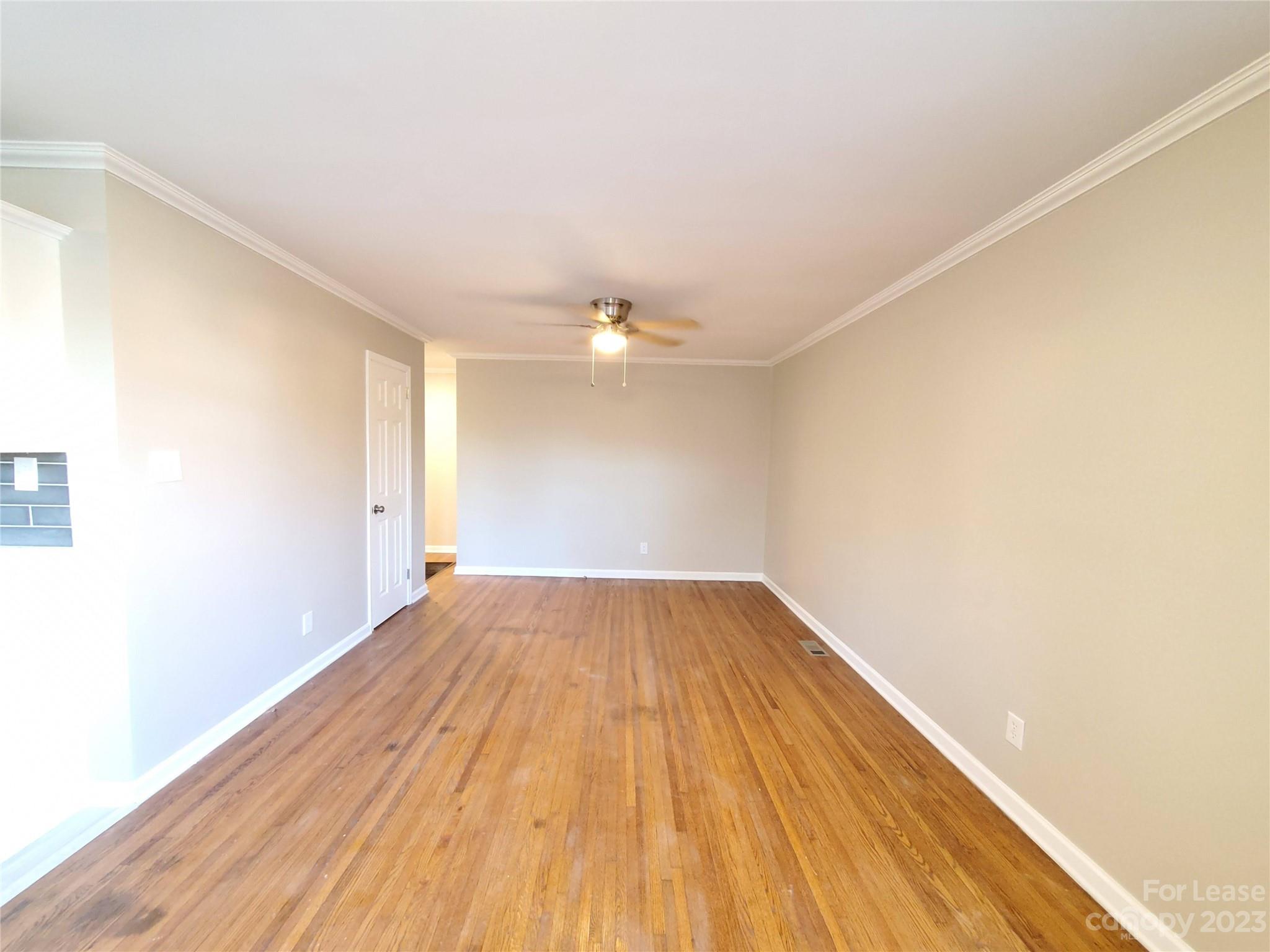 1545 Walton Road, Unit 1547 Charlotte, NC 28208 - Photo 20 of 25 a view of empty room with wooden floor