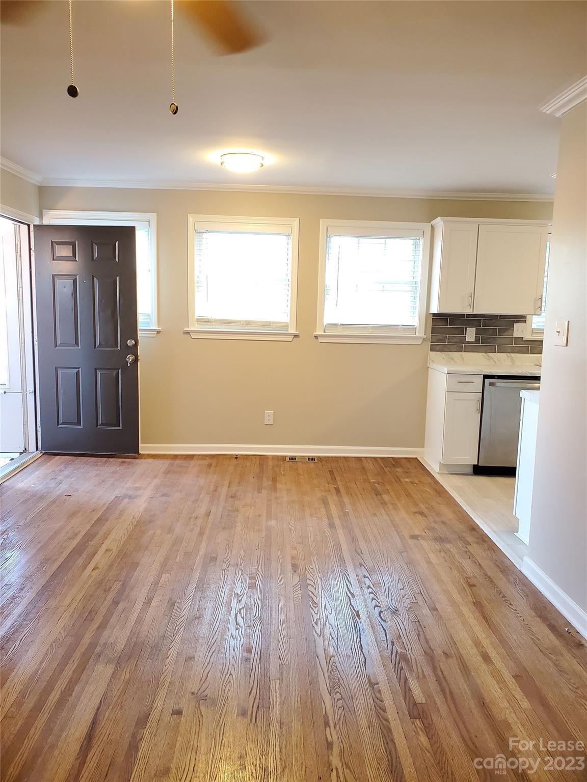 1545 Walton Road, Unit 1547 Charlotte, NC 28208 - Photo 4 of 25 a view of a kitchen with a sink and a window