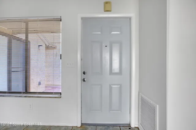 $154,000 | 1031 Abada Court Northeast, Unit 110, Palm Bay, FL 32905