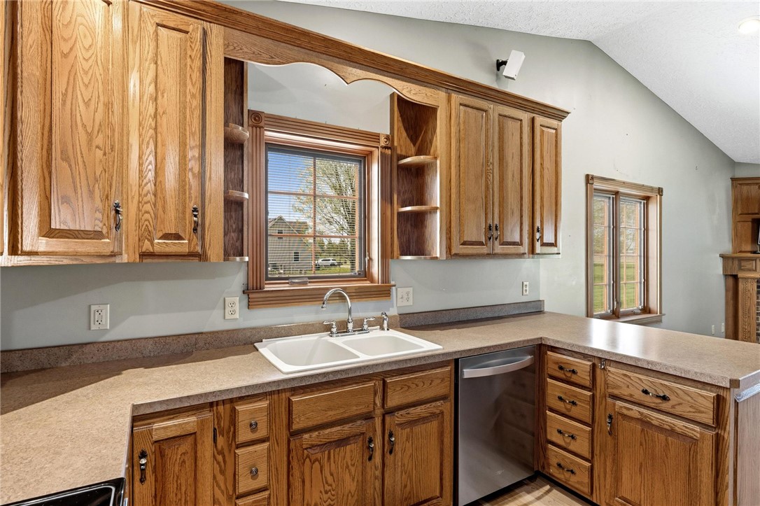 4971 Lackey Road Cedarville, OH 45314 - Photo 53 of 79 This spacious kitchen offers ample cabinetry, a double basin sink, and a dishwasher.