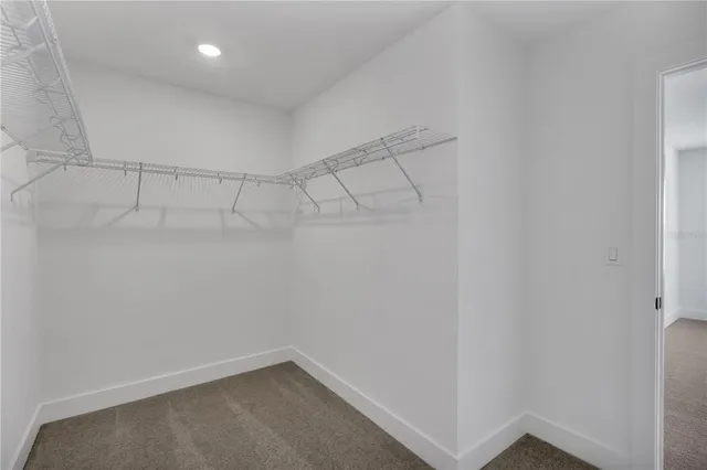a bathroom with a double vanity sink mirror and shower