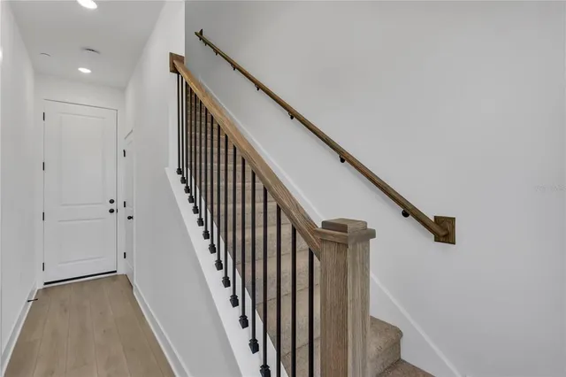 a view of a hallway with staircase