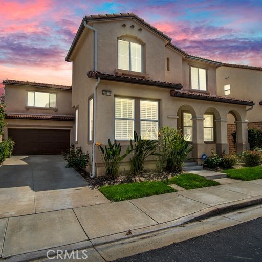 28919 Mirada Circulo Valencia, CA 91354 - Photo 1 of 1 a front view of a house with garden