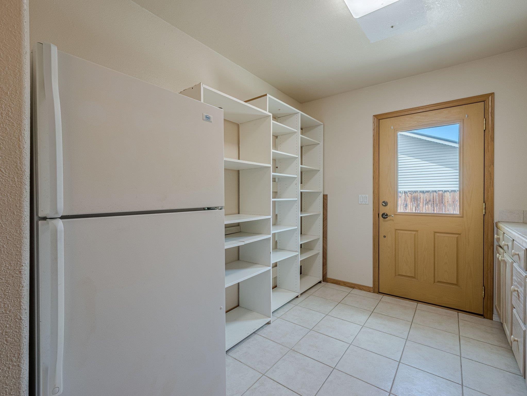 526 North Oak Street Fruita, CO 81521 - Photo 17 of 42 a view of walk in closet with empty racks