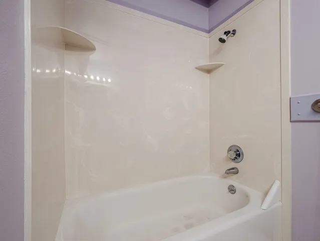 a bathroom with a bathtub