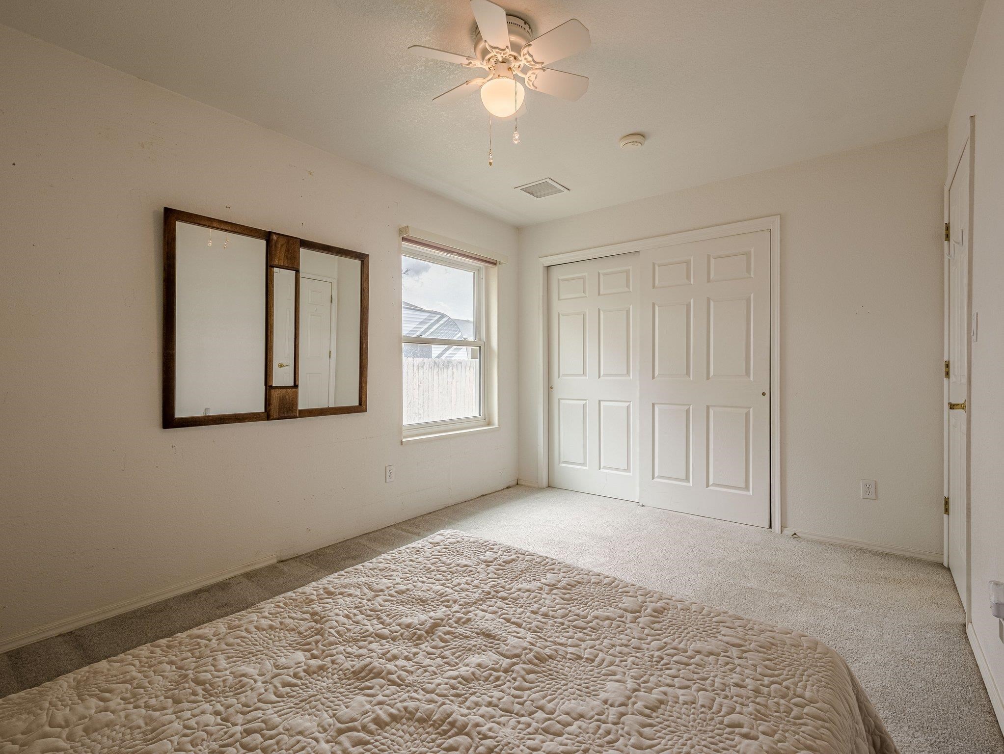 526 North Oak Street Fruita, CO 81521 - Photo 25 of 42 a view of empty room with window and ceiling fan