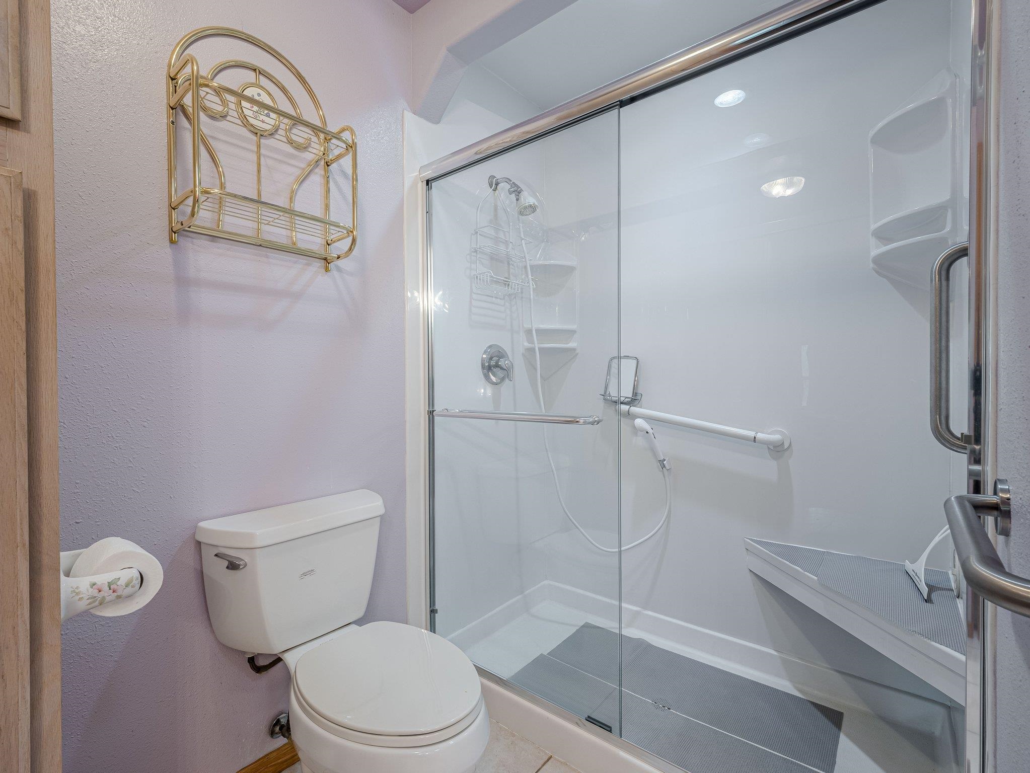 526 North Oak Street Fruita, CO 81521 - Photo 29 of 42 a white toilet sitting next to a bathroom sink