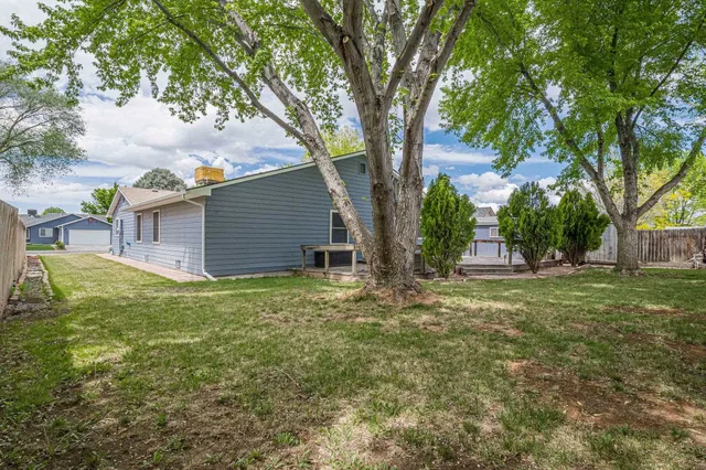 a fire hydrant in the middle of a field