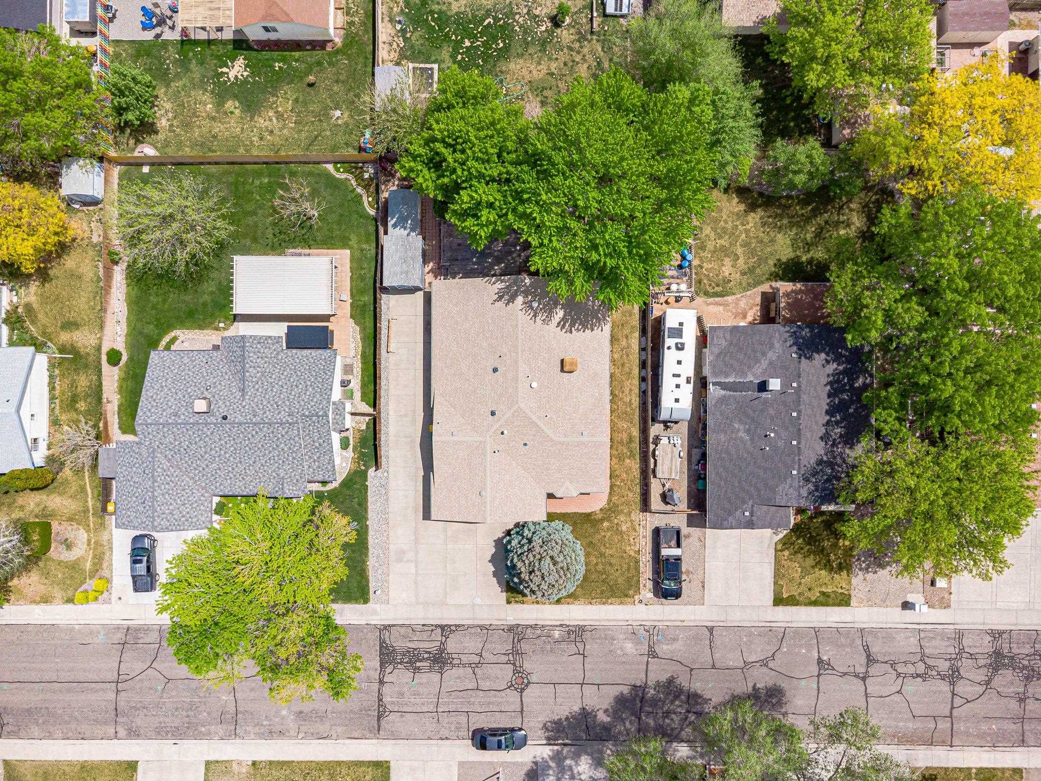 526 North Oak Street Fruita, CO 81521 - Photo 42 of 42 an aerial view of a house with outdoor space and trees all around