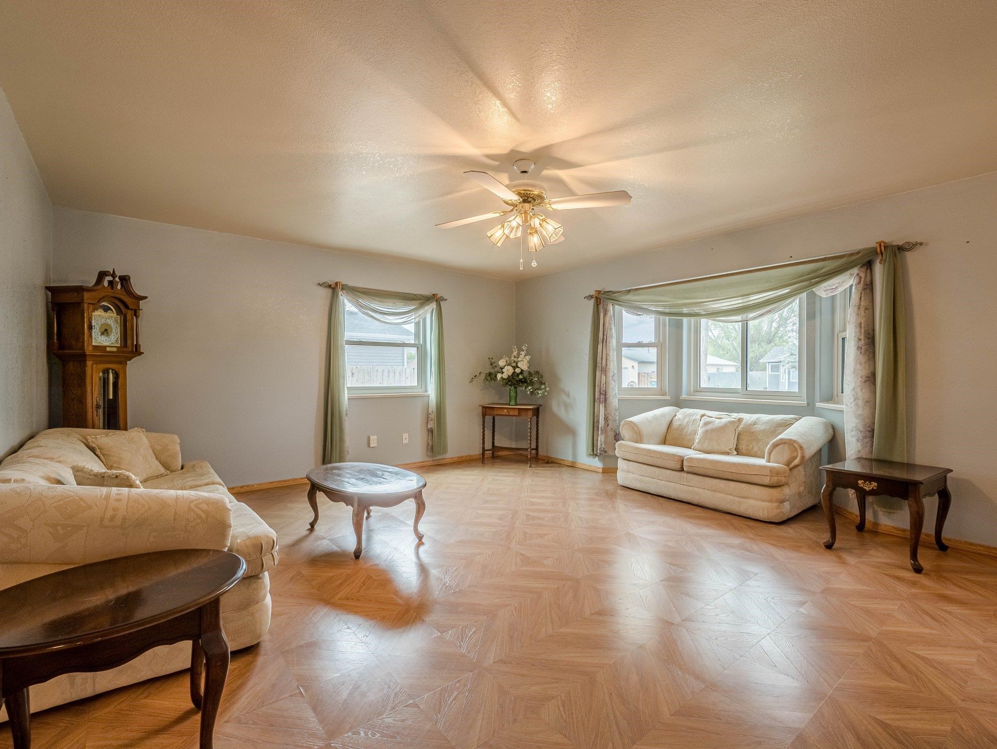 526 North Oak Street Fruita, CO 81521 - Photo 5 of 42 a living room with furniture and a window