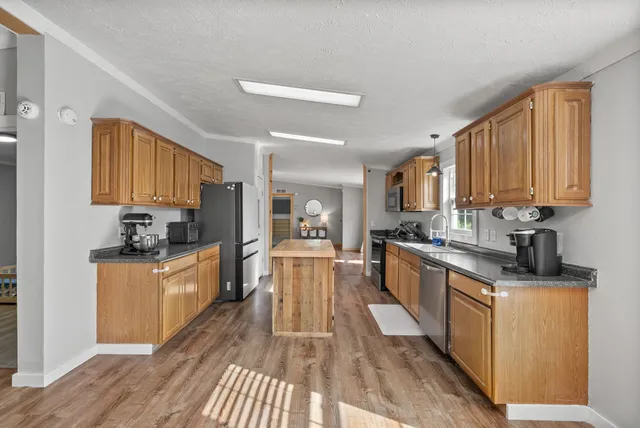 a view of a kitchen with cabinets