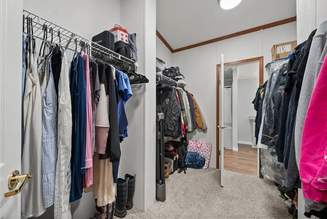 a view of a bathroom sink mirror and toilet