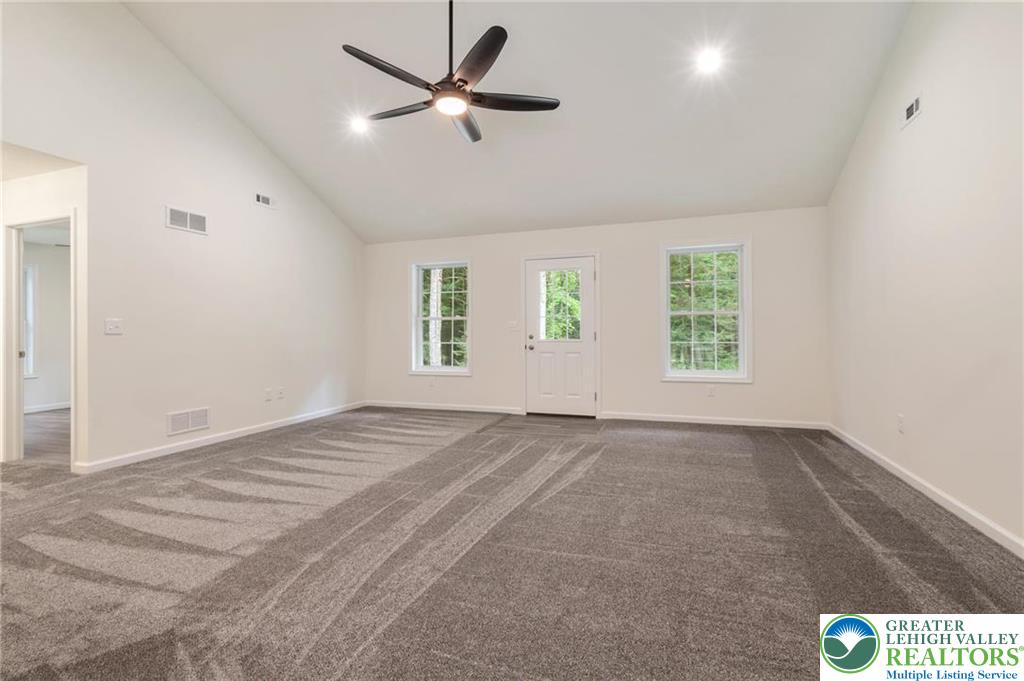 16 Ricks Road New Ringgold, PA 17960 - Photo 13 of 15 an empty room with windows and fan