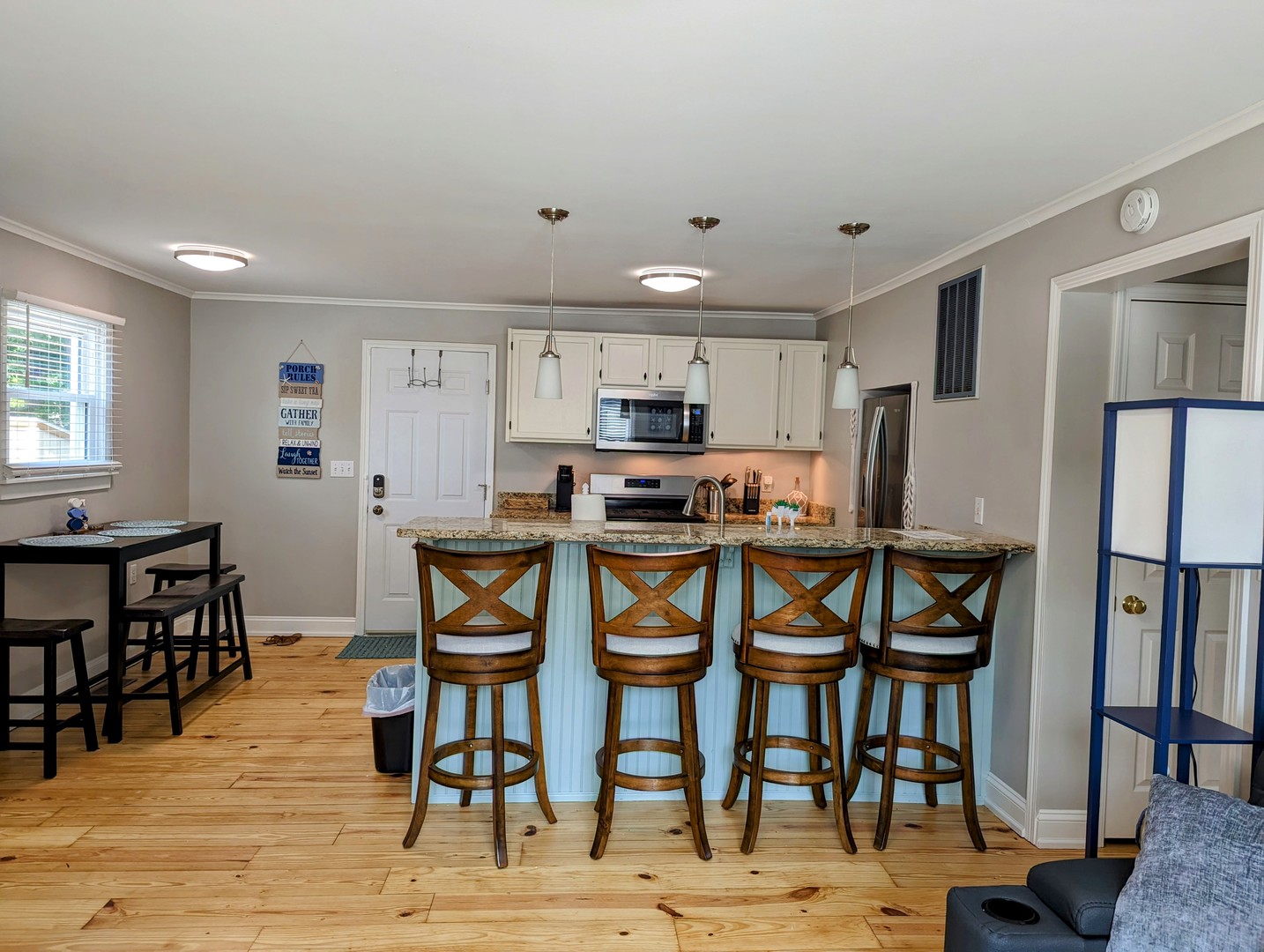 3 North Maple Avenue Fox Lake, IL 60020 - Photo 5 of 24 a view of kitchen with refrigerator and wooden floor