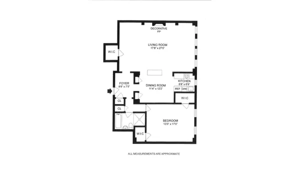 a bedroom with a bed a couch and dresser