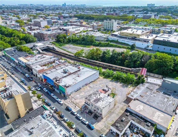an aerial view of a city with lots of residential buildings