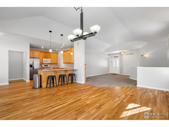 a view of a kitchen and dining room