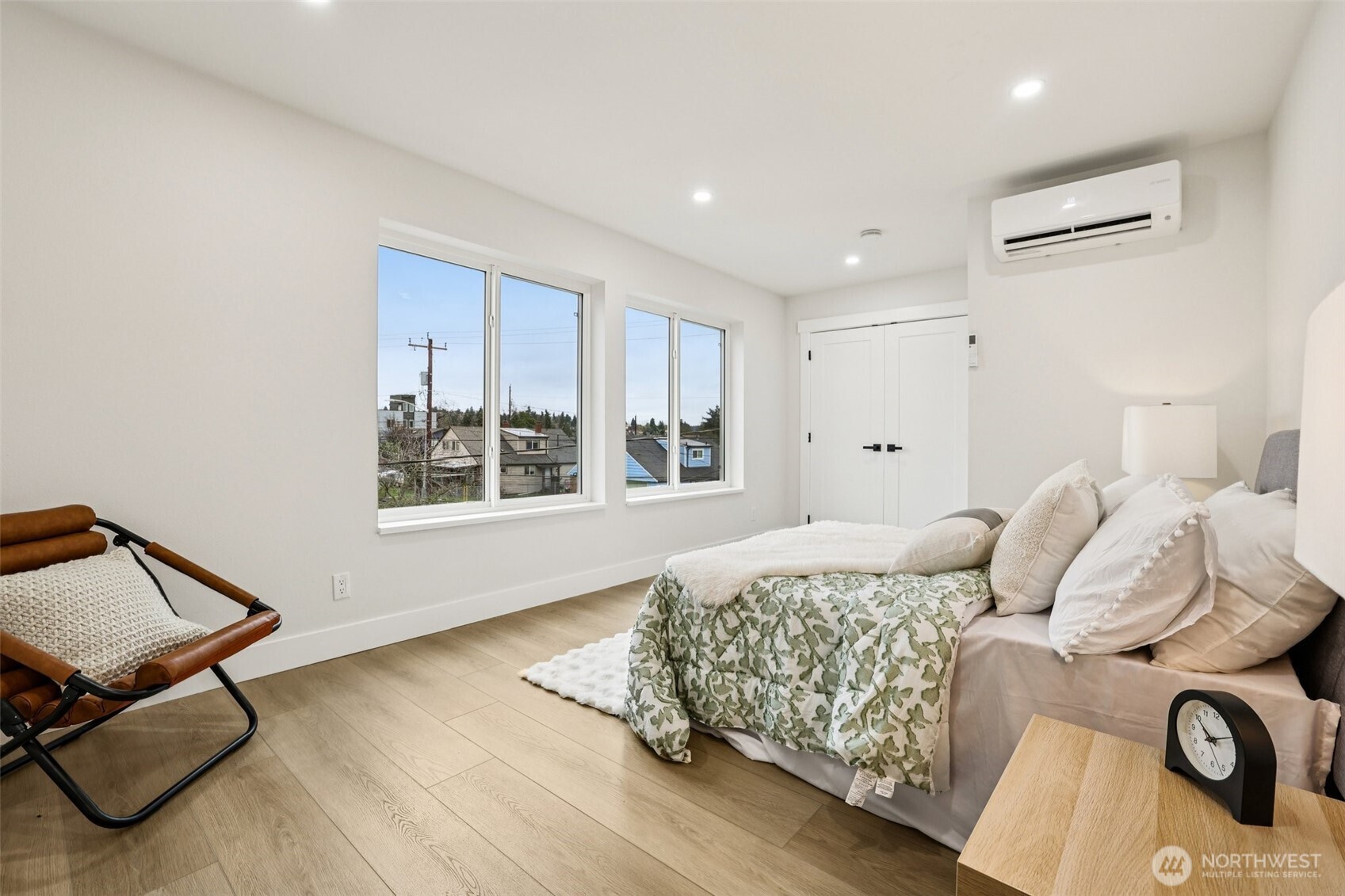 7719 Renton Avenue South, Unit B Seattle, WA 98118 - Photo 23 of 35 a bedroom with a bed and a window