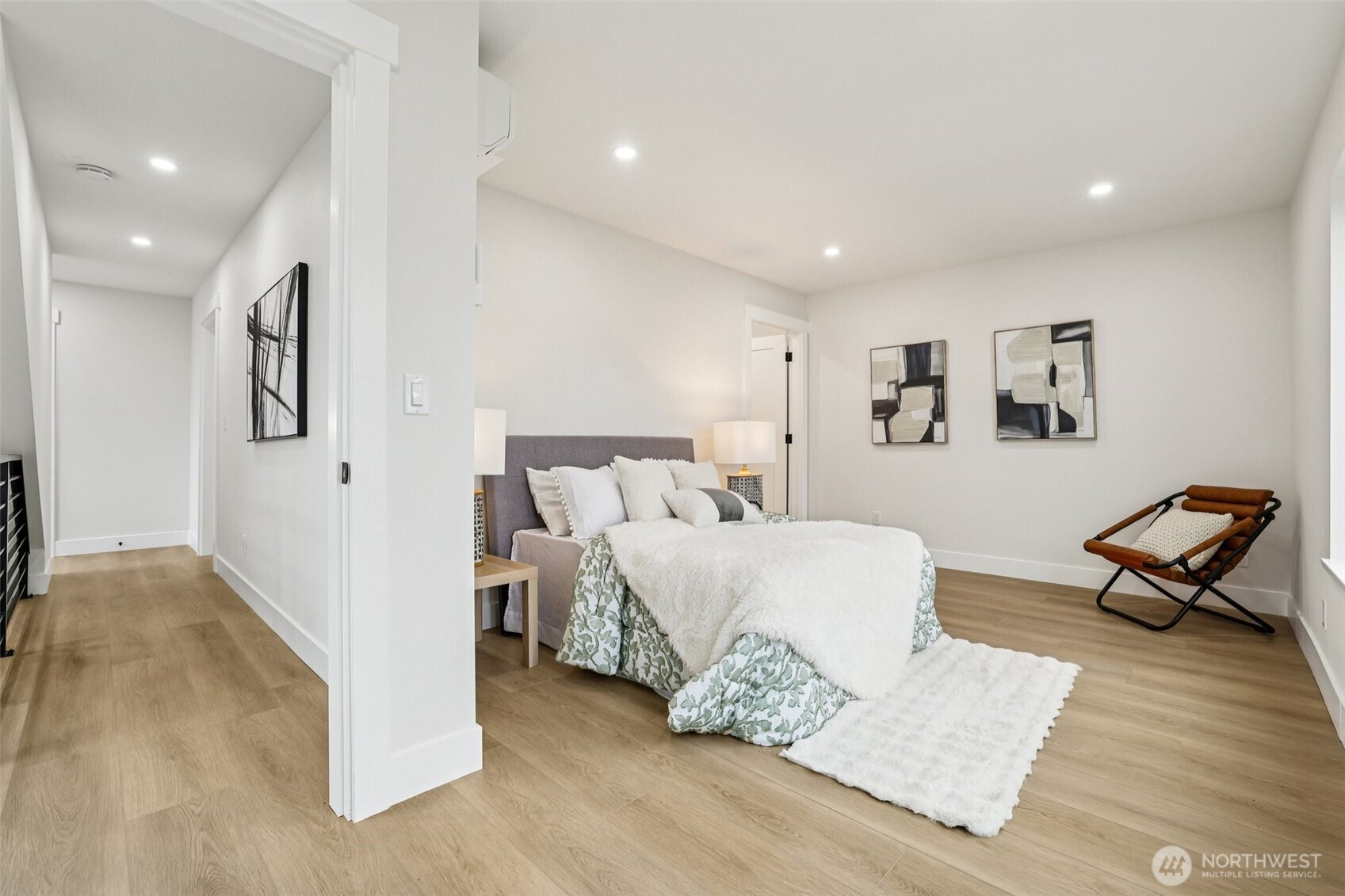 7719 Renton Avenue South, Unit B Seattle, WA 98118 - Photo 24 of 35 a living room with furniture and a rug