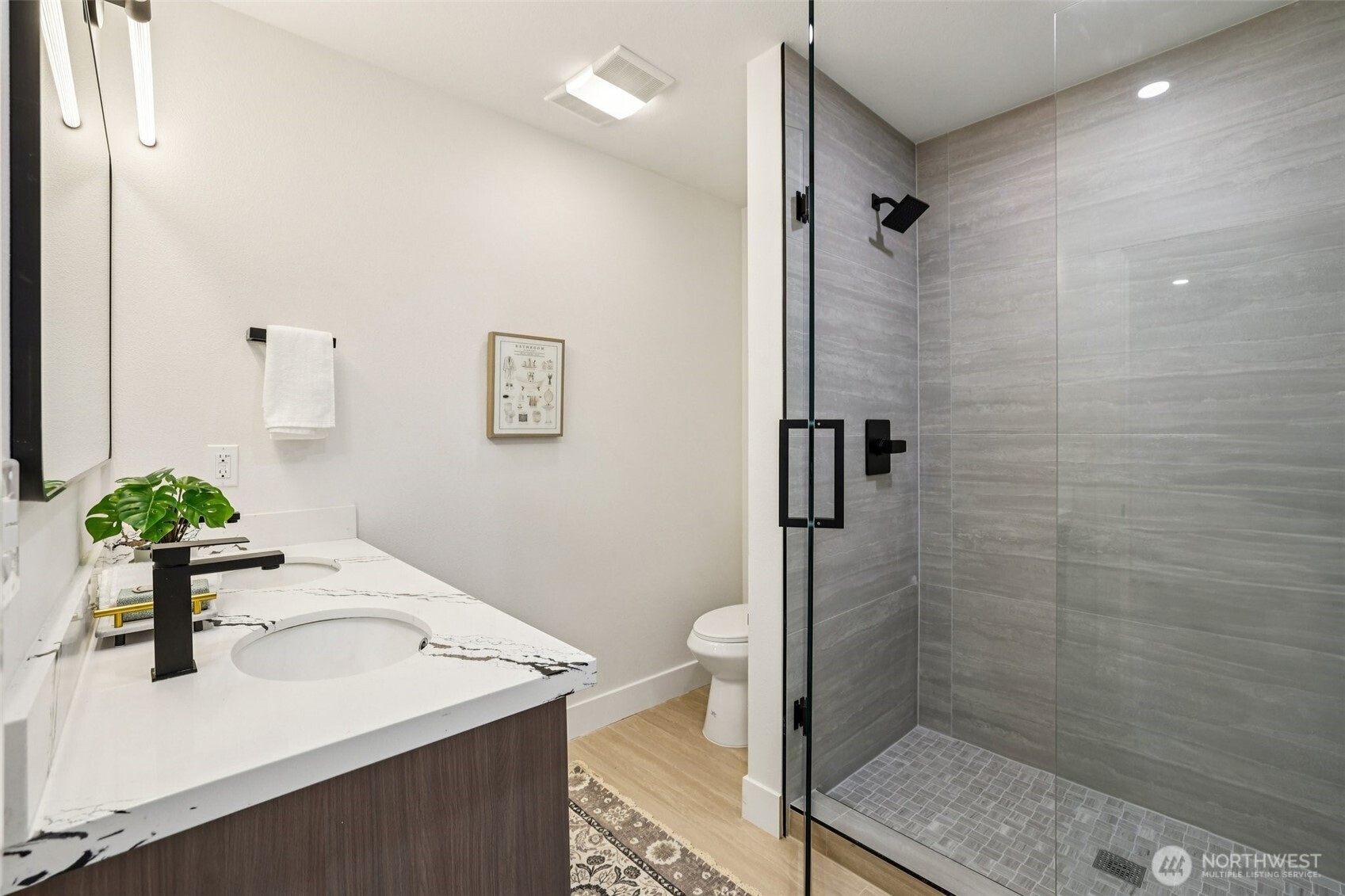 7719 Renton Avenue South, Unit B Seattle, WA 98118 - Photo 25 of 35 a bathroom with a sink toilet and shower