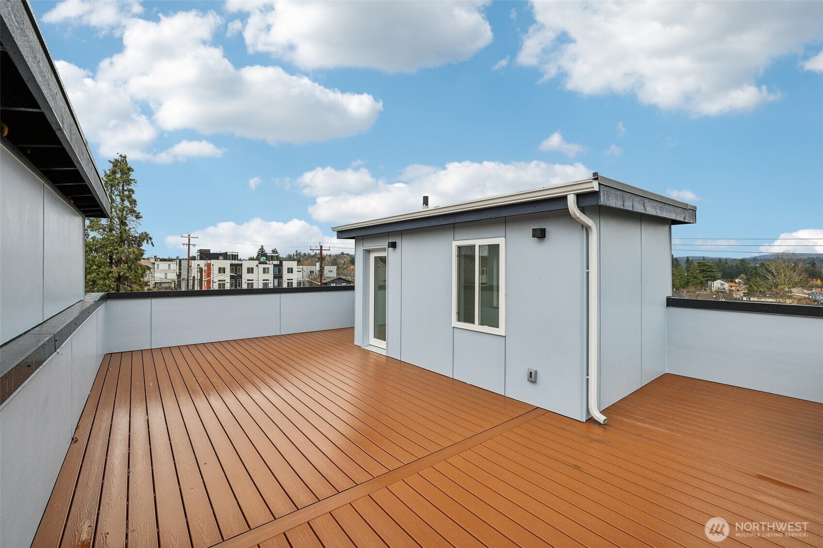 7719 Renton Avenue South, Unit B Seattle, WA 98118 - Photo 35 of 35 a view of a terrace with sky view