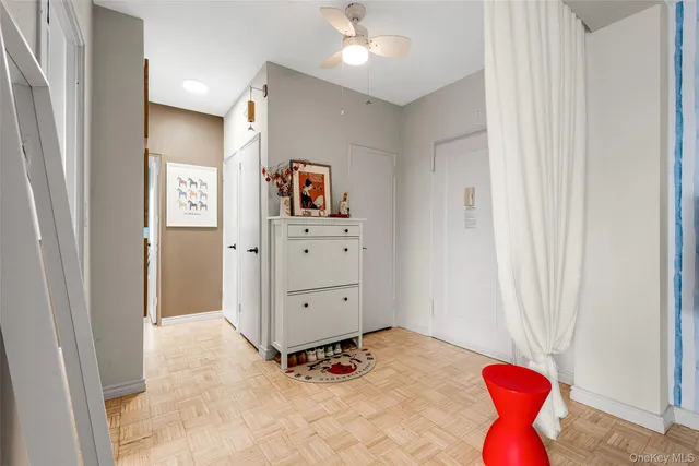 a living room with furniture and white walls