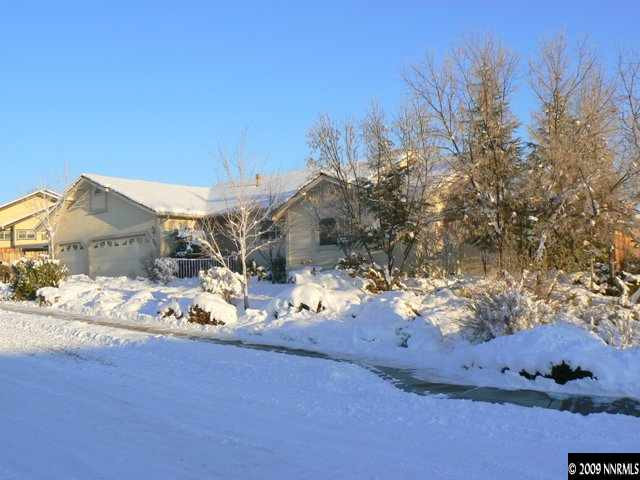 905 University Place Reno, NV 89512 - Photo 1 of 9 a view of a house with a snow in the yard