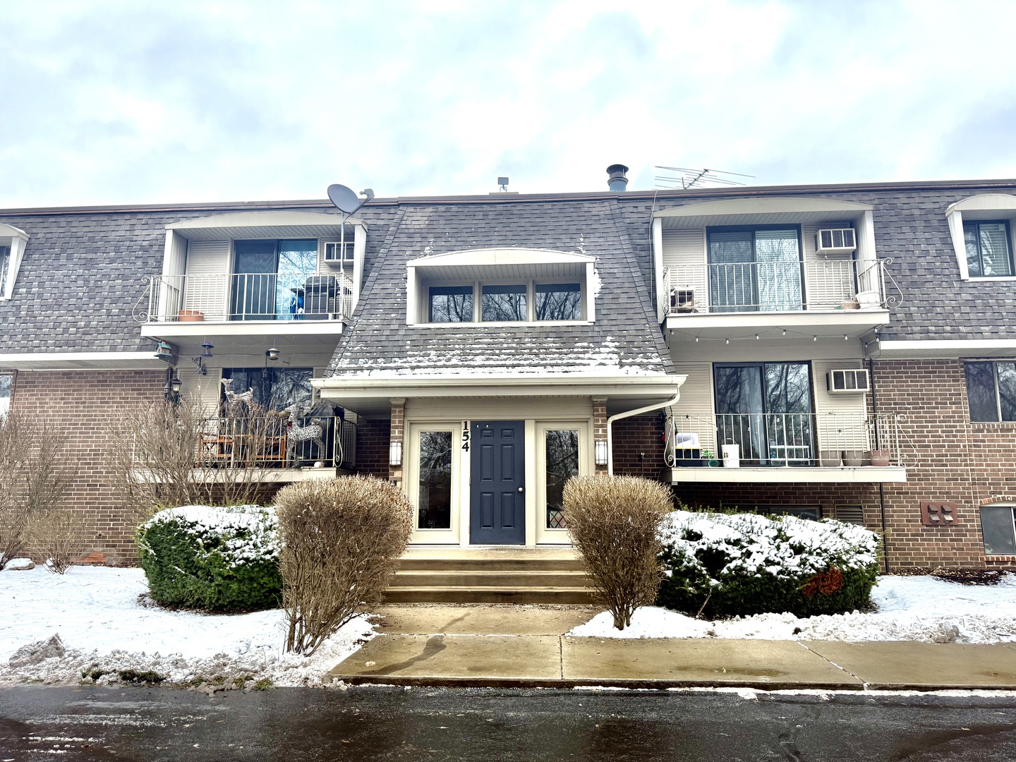 a front view of a house with entertaining space