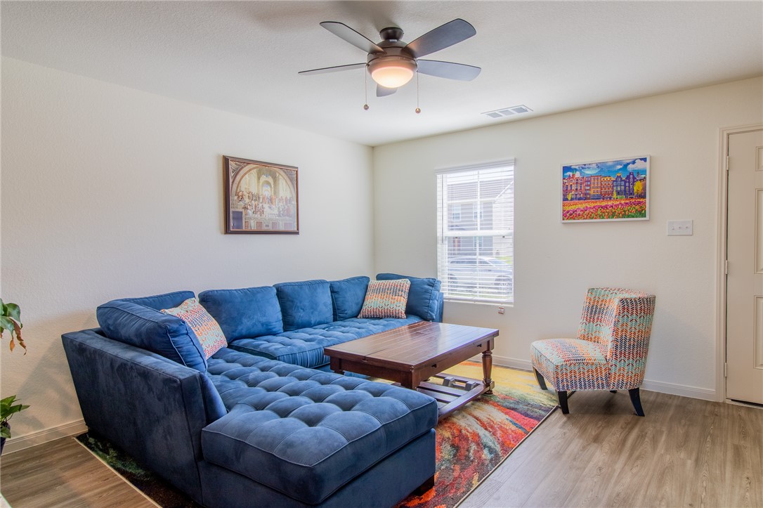 6029 Toby Bend Bryan, TX 77807 - Photo 6 of 25 a living room with furniture and a window