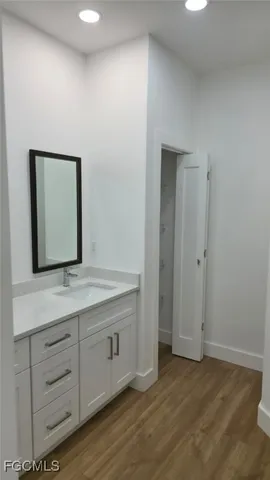 wooden floor in a hall with an entryway