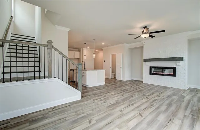 a view of an empty room with a fireplace