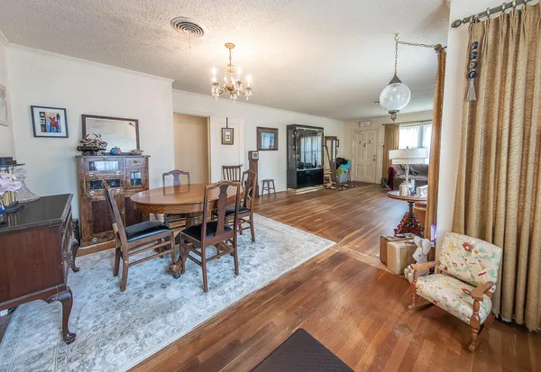 a view of a dining room with furniture