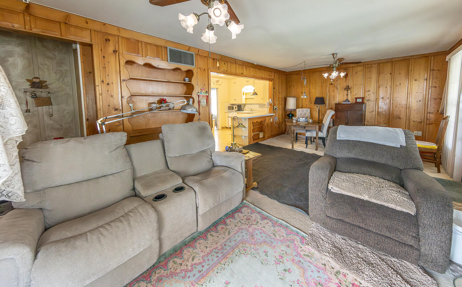 1718 28th Street Lubbock, TX 79411 - Photo 8 of 23 a living room with furniture and a large window