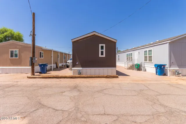 a view of a house with a snow in the yard