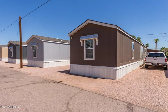 a front view of a house with parking