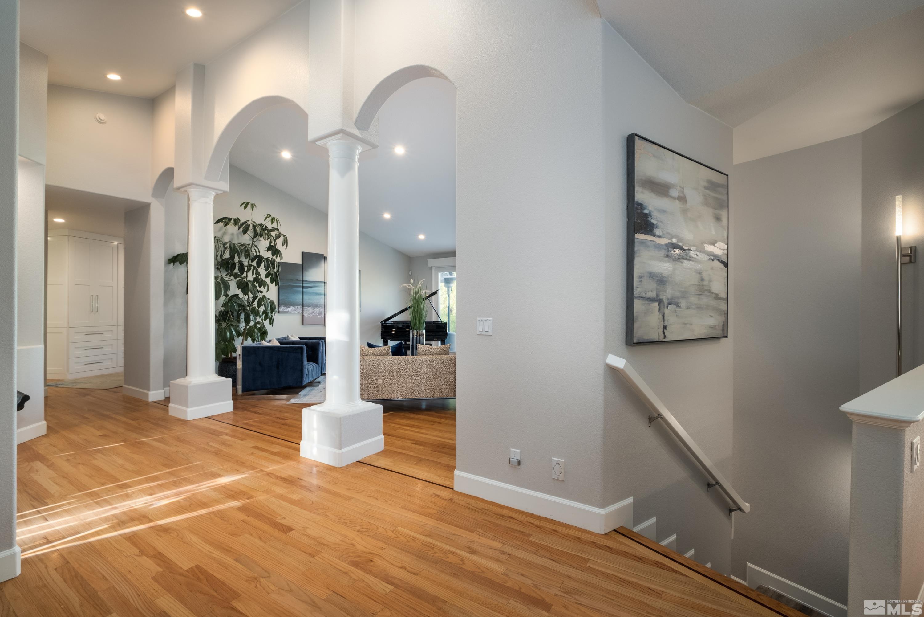 4300 Juniper Trail Reno, NV 89519 - Photo 21 of 39 a view of a hallway with wooden floor and furniture