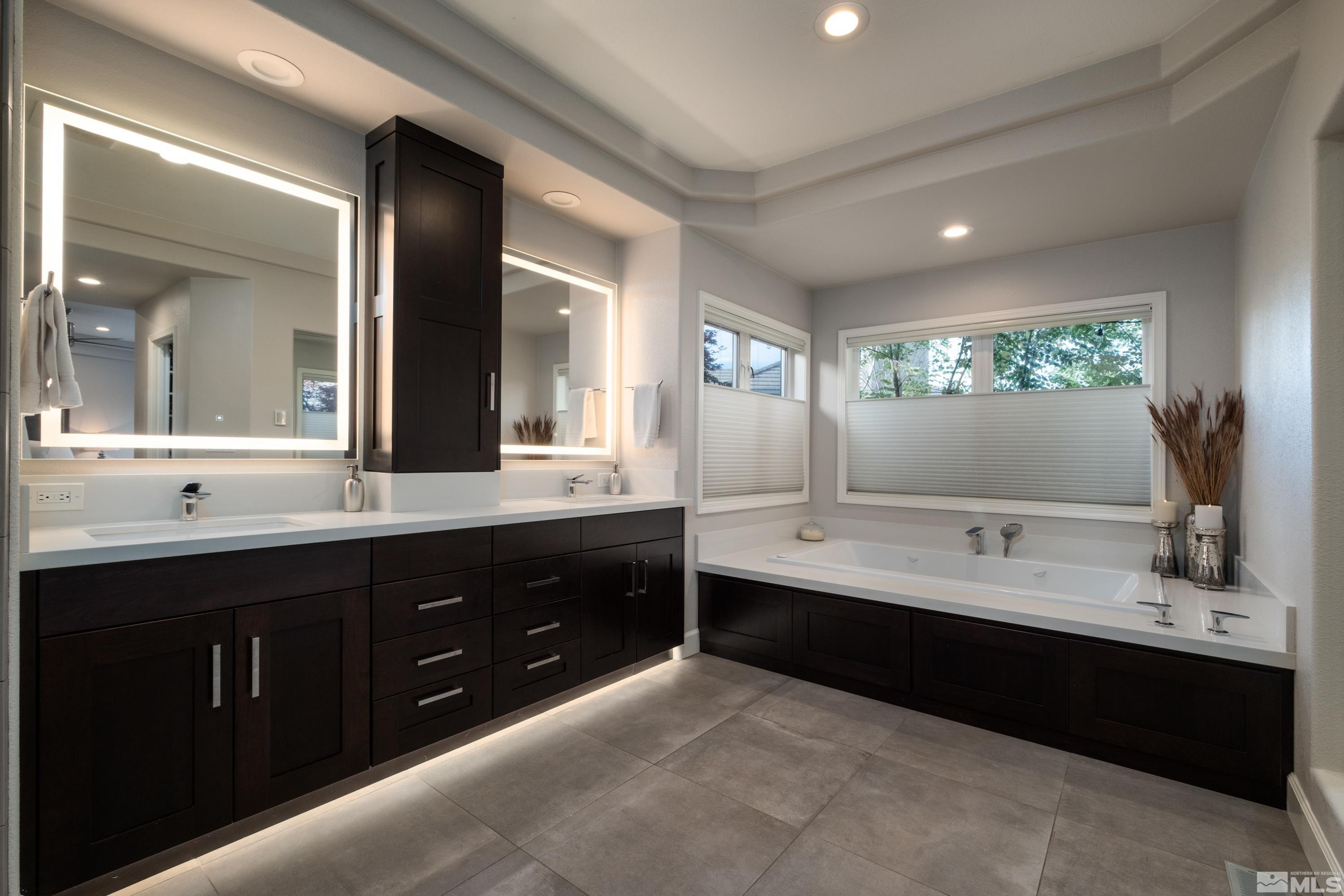 4300 Juniper Trail Reno, NV 89519 - Photo 29 of 39 a bathroom with a double vanity sink mirror and bathtub