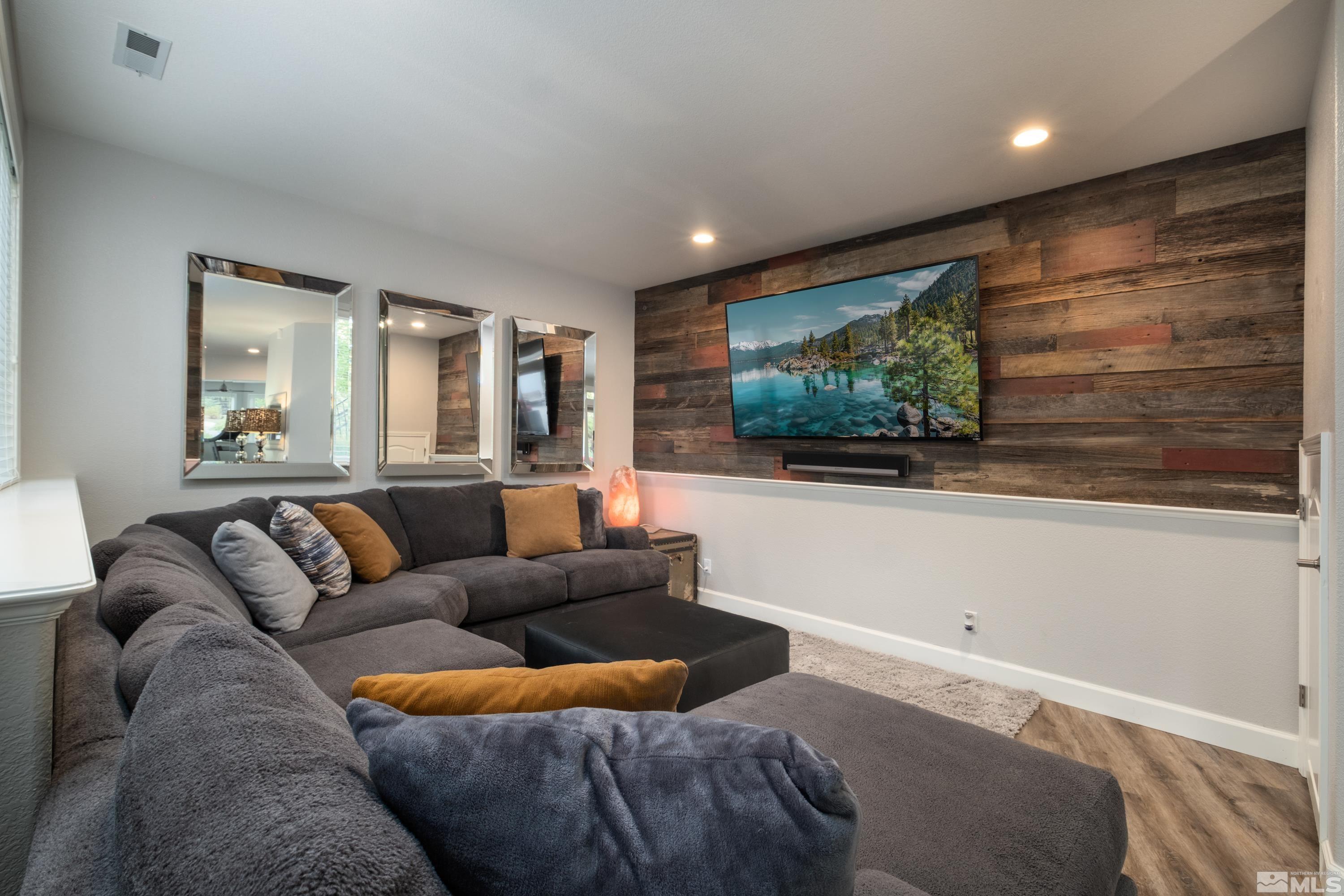 4300 Juniper Trail Reno, NV 89519 - Photo 33 of 39 a living room with furniture and a flat screen tv