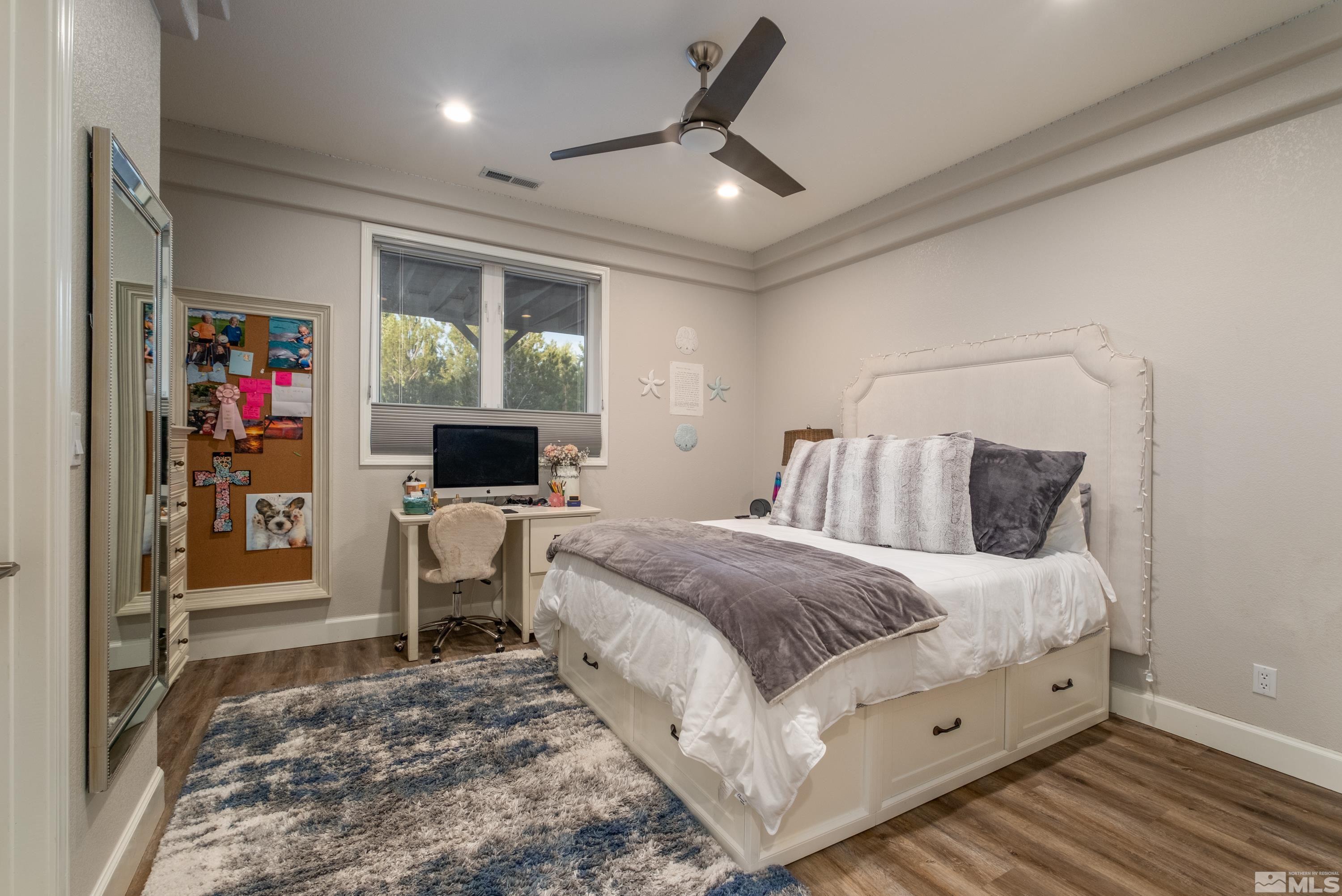 4300 Juniper Trail Reno, NV 89519 - Photo 36 of 39 a spacious bedroom with a bed and a mirror