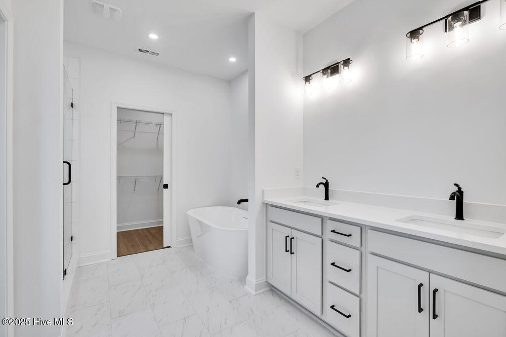 745 Caisson Run Wilmington, NC 28412 - Photo 20 of 43 Primary Bathroom with Dual Vanity