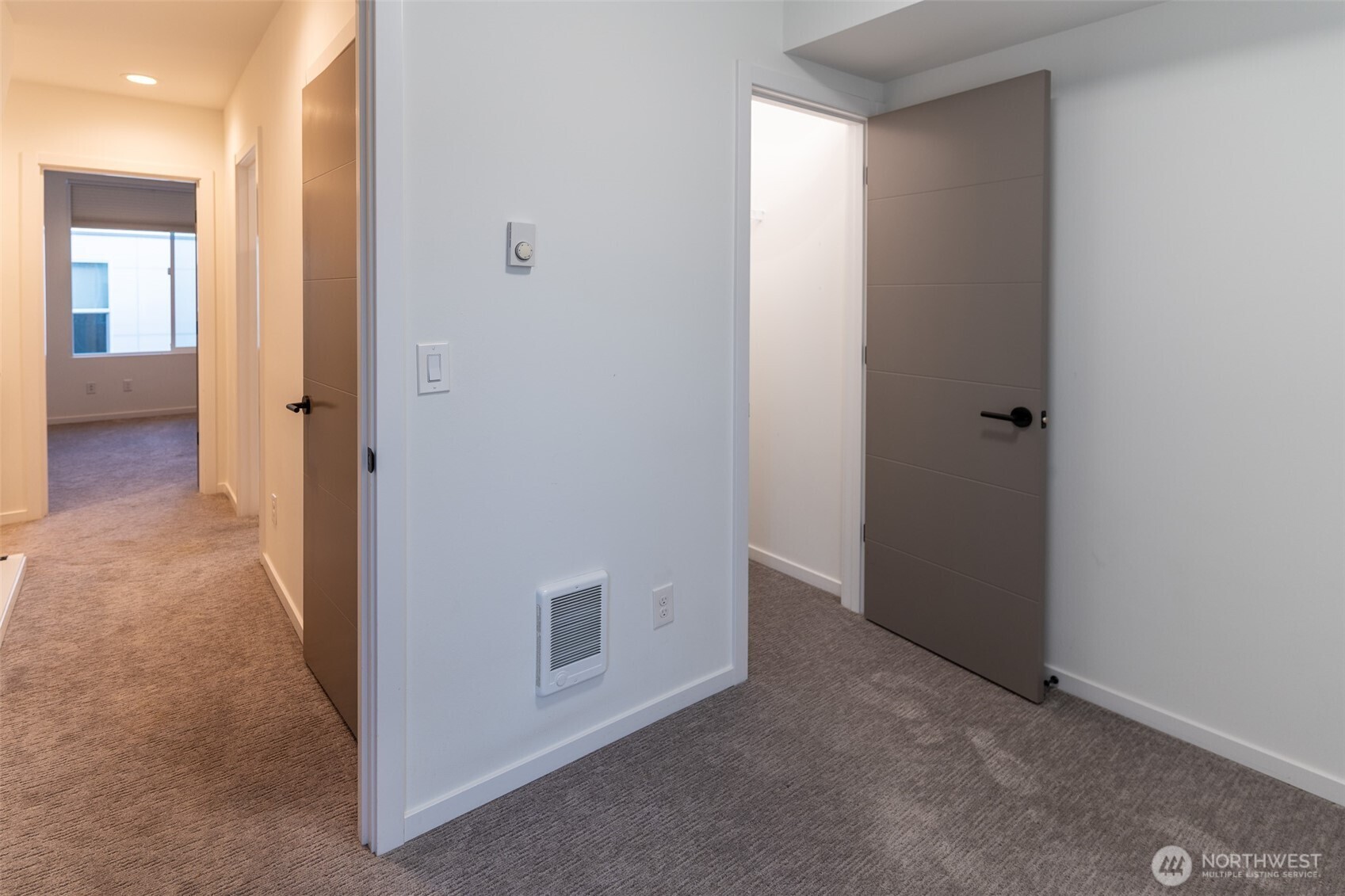 9030 18th Avenue Southwest, Unit B Seattle, WA 98106 - Photo 13 of 20 a view of a hallway with closet