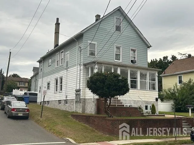 a front view of a house with garage
