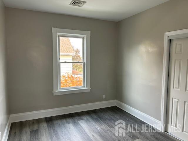 191 Fulton Street, Unit 2 Woodbridge, NJ 07095 - Photo 8 of 22 an empty room with a window